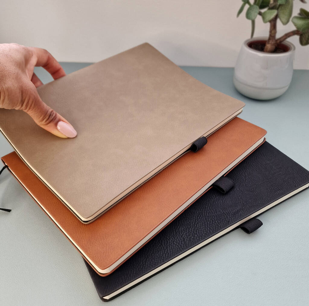 Three notebooks in Dark Cream, Brown and Black