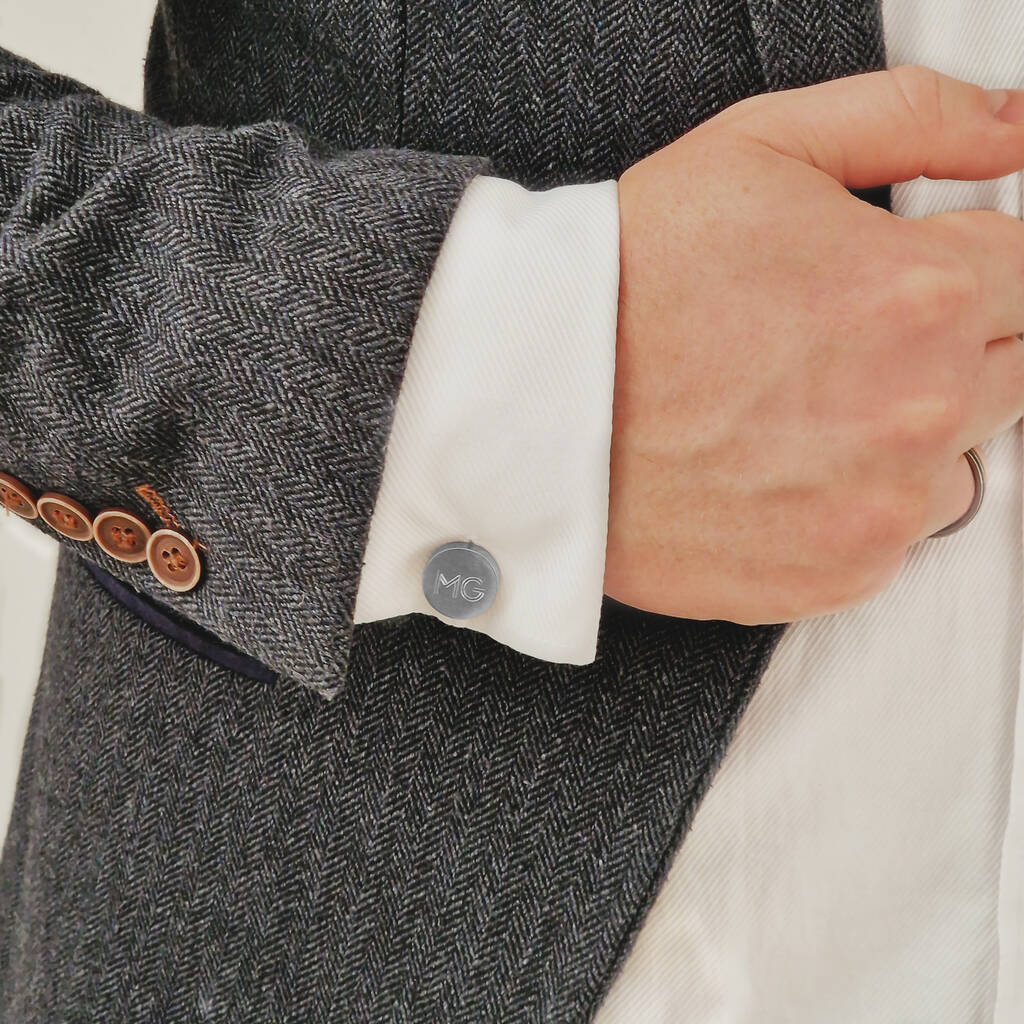 Rhodium cufflink engraved with geometric text
