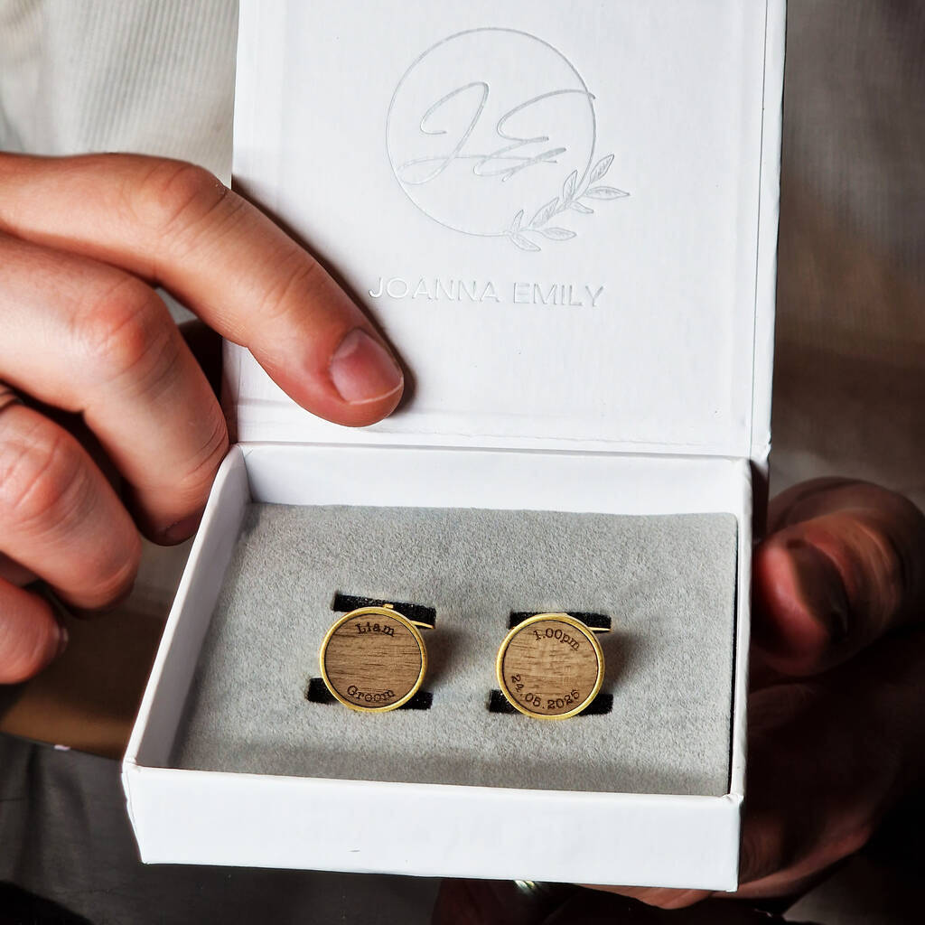 two gold cufflinks personalised and in a gift box