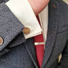 rhodium plated cufflink on a sleeve