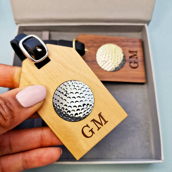 Luggage tag with golf ball inlay