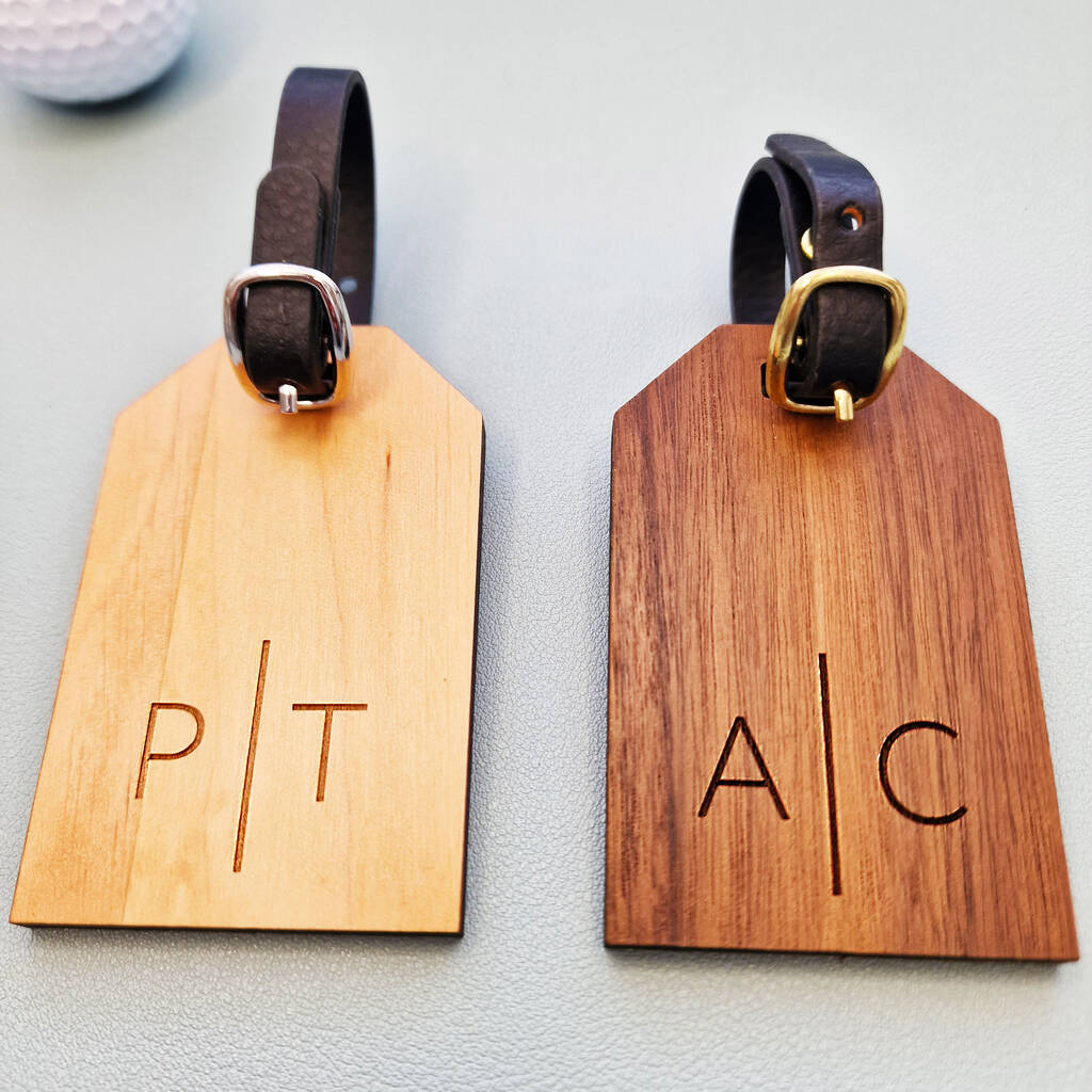 Two personalised luggage tags in alder wood and walnut wood