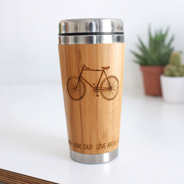 wooden travel mug with bicycle illustration