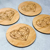 Set of four woodn geometric heart coasters