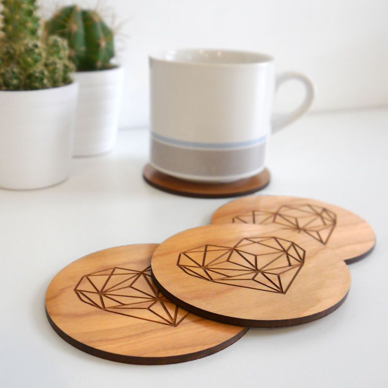 Geometric heart coasters stacked with mug